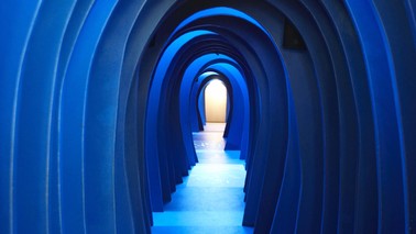 View of a blue colored corridor