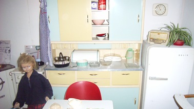 A kitchenette in the 50s style with table and chairs.