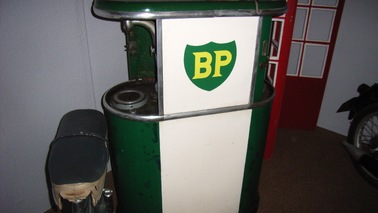 Petrol pump with the initials BP in yellow on a green background.