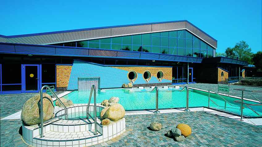 A swimming pool in the outdoor area.