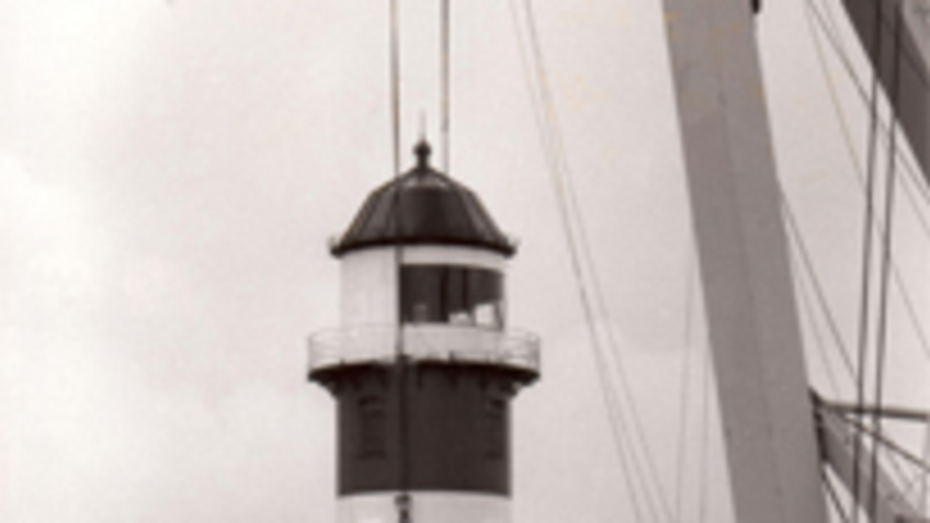 Lighthouse is raised with a crane.