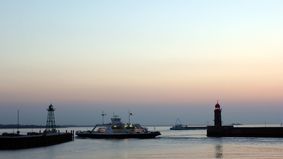 A ferry at sunrise.