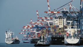 Container ships are located on a quay.