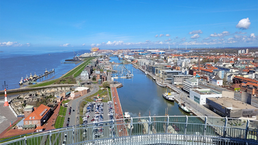 View from the look-out platform Sail City to the New Harbour with the "Schulschiff Deutschland" 