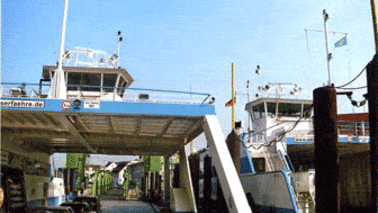 Two ferries lie on a feeder.