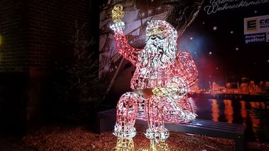 An illuminated Santa Claus.