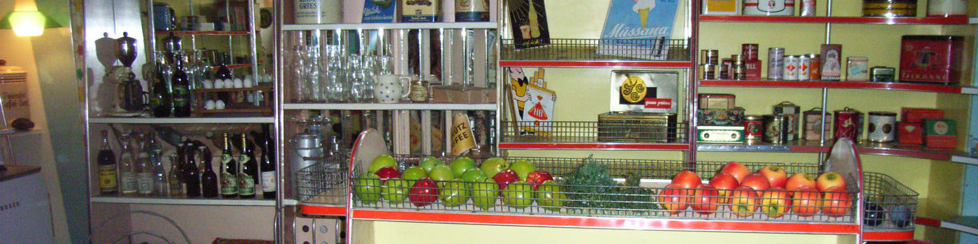 Shelves in a department store with food.
